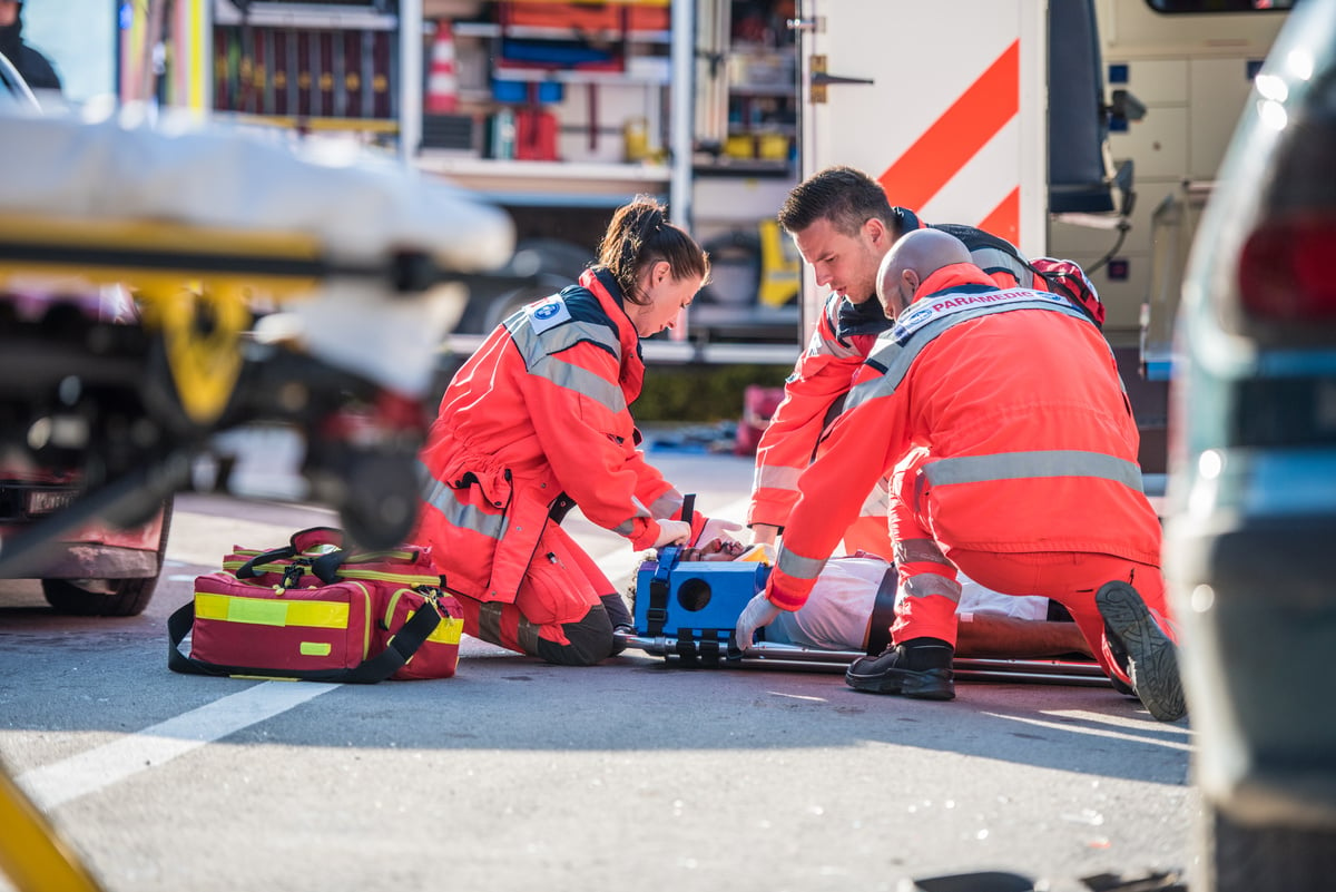 Paramedics providing first aid